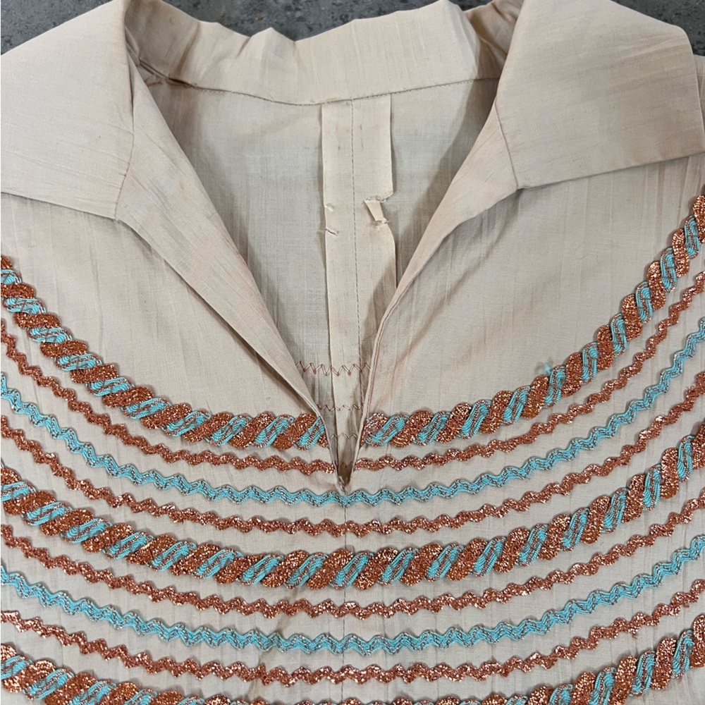 Vintage 1950s cotton patio set. Copper and Turquoise accents on tan cotton.